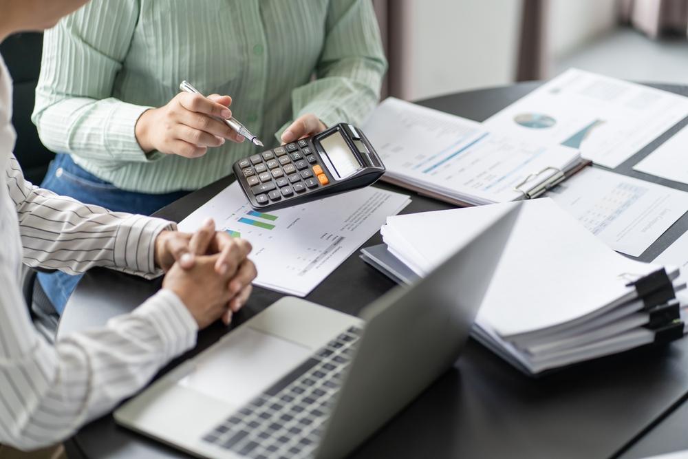 Invoice tracking and payment records organized for an Anchorage small business
