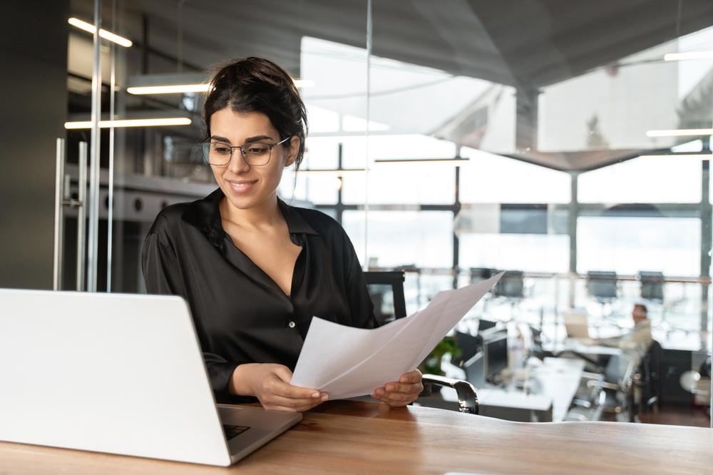 Anchorage business owner preparing client invoices and billing records