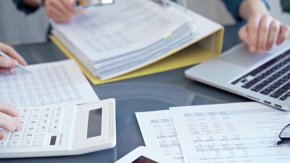 Monthly bookkeeping routine keeping organized financial records for an Anchorage business